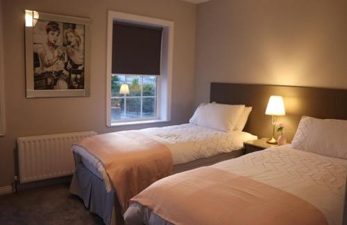 Banbridge House | The Grey Door 2 Bed Cottage Banbridge Parking Private Garden l WeStay Belfast Short Lets And Serviced Accommodations