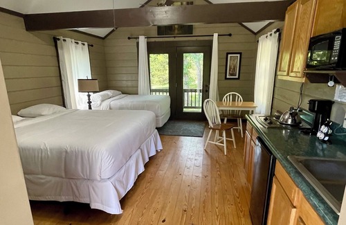 Gallatin Cabin | The hideaway retreat cabin has views of open fields and sweet water lake.