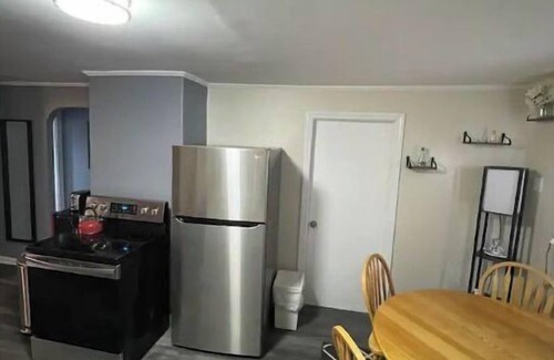 Pawtucket Apartment | The house with the green roof. It’s a Home away from home
