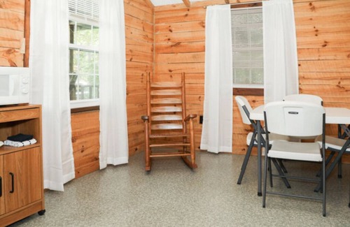 Milroy Cabin | The Log Cabin At Hartman center