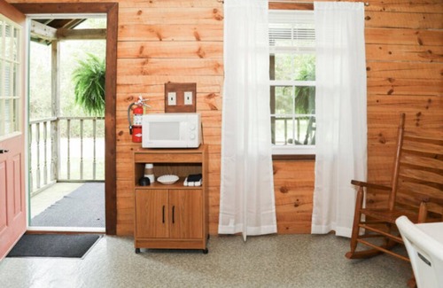 Milroy Cabin | The Log Cabin At Hartman center