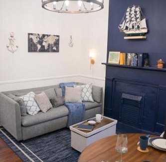 Savannah Victorian District Apartment | The Maiden Voyage - Themed Getaway, Steps to Forsyth, King Bed, Grill, Games, Picnic Basket