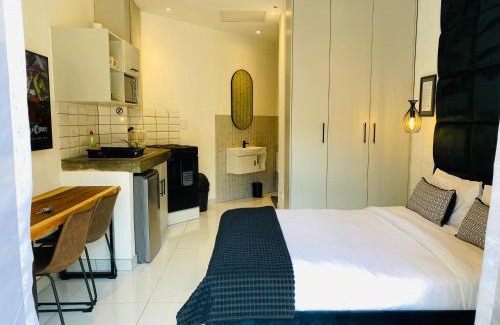Downtown Johannesburg Apartment | The Monochrome Apartment 209 - Urban Chic Escape - Open Plan Bathroom with Bathtub