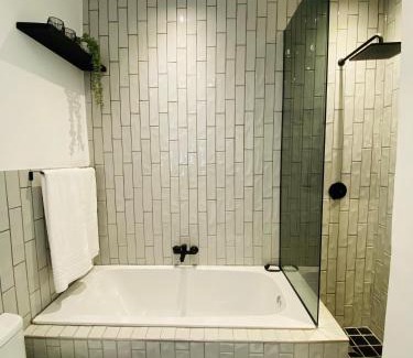 Downtown Johannesburg Apartment | The Monochrome Apartment 209 - Urban Chic Escape - Open Plan Bathroom with Bathtub