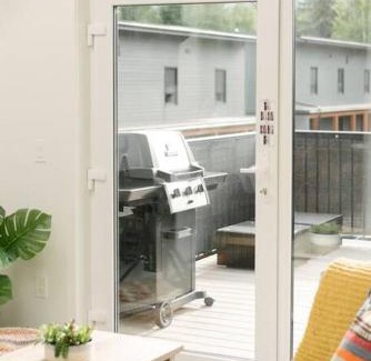 Revelstoke House | The Nest - Condo with Hot Tub & BBQ