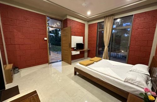 Diveagar Hotel | The Oasis Resort