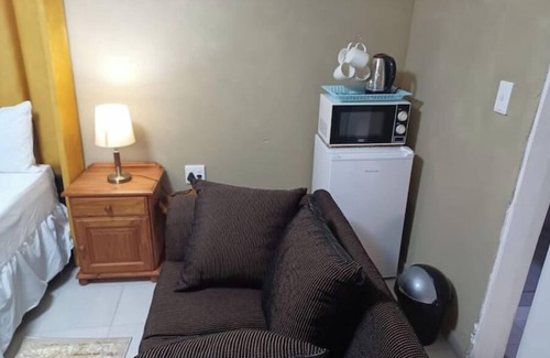 Greater Johannesburg Metropolitan Area Apartment | The Ogans Sunset Roomnn