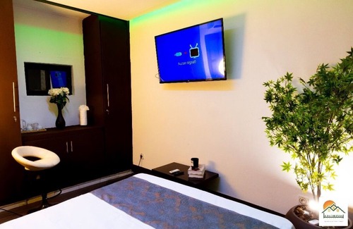 Yaounde Apartment | The Pandora: Secure and stylish studio with sofa bed, WiFi, smart TV and tub