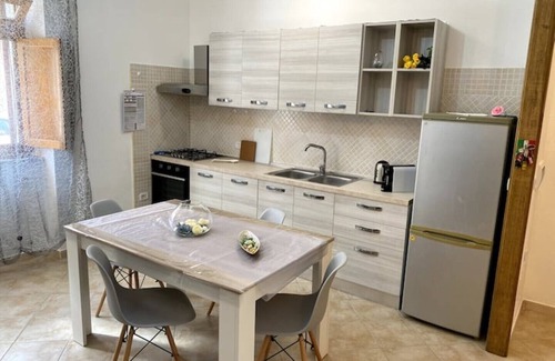 Nulvi Apartment | The Pearl House Isis with 2 rooms, private garden