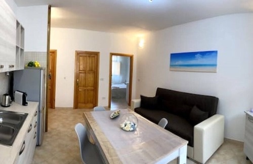 Nulvi Apartment | The Pearl House Isis with 2 rooms, private garden