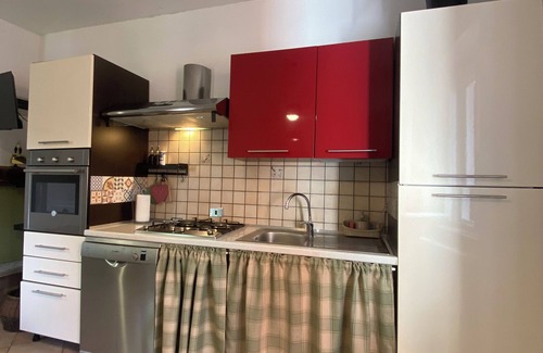 Orta San Giulio Apartment | The Pink House of Riso Amaro In the painted village Legro of Orta San Giulio