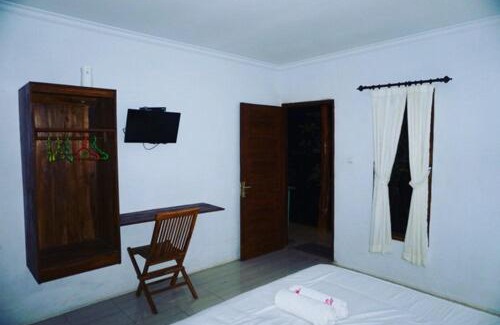 Sampalan Bed & Breakfast | The Rahayu Cottage upper room