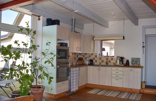 Glemminge House | The renovated cottage on a round yard with beautiful views of the open countryside just outside the
