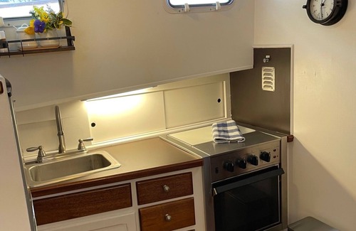 Historic Downtown Manteo Boat Rental | THE STARRY BANNER! Classic yacht docked in historic downtown Manteo Marina