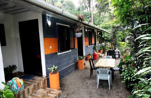 Kunchithanny House | The wayside valley cottage