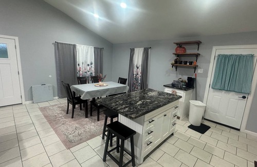 Harlingen House | This charming three-bedroom, two-bathroom home is perfect for your weekend!