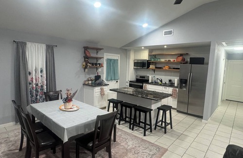 Harlingen House | This charming three-bedroom, two-bathroom home is perfect for your weekend!