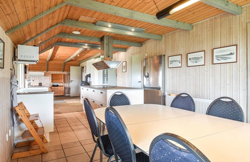 Houvig Strand House | This cozy cottage is located under a romantic thatched roof.