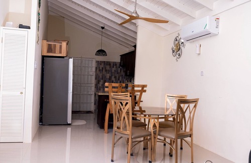 Falmouth House | This cozy home is ten minutes from the turquois waters of the Caribbean sea.