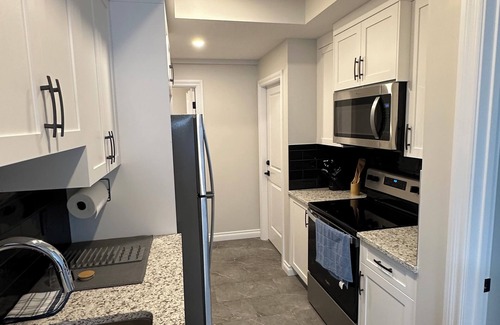 Southwest Calgary House | This fully furnish 2bedroom and a full bath gives you cozy & relaxing experience