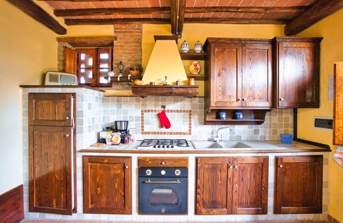 Montalcinello Other | This ground floor house (55 sqm) consists of a living room with fireplace, satellite tv and kitchen