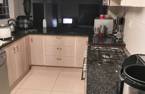 Windhoek House | This is a home stay. With a loving family.