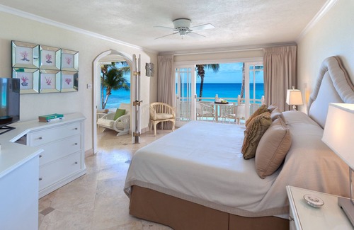 Saint Peter Parish Condo | This Penthouse is situated directly on a beautiful sandy beach and has a wonderful roof deck terrace