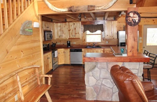 Luray Cabin | This property is located on a 65 acre farm on the Shenandoah River.