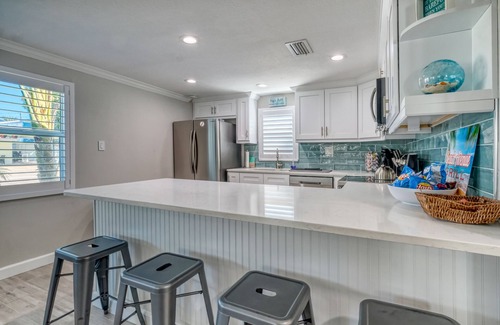 Redington Shores House | THIS STUNNING home is RENOVATED and furnished W/Beach Access a block away!