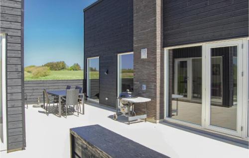Nørre Lyngby House | Three-Bedroom Holiday Home Løkken With A Fireplace 07