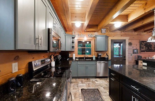 Tazewell Cabin | Three-story lake-view cabin with private hot tub, pool table, fireplace & AC