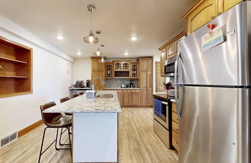 Campbellsport Condo | Tiki Beach Condo, with stunning lake views, beach access & bar/restaurant onsite