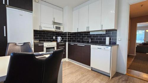 Tampere Apartment | Tilava kaksio, saunalla ja sähköauton latauksella.