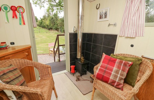 Llanfihangel Tal-y-llyn Cottage | TILLY GYPSY-STYLE CARAVAN HUT, pet friendly in Llangorse