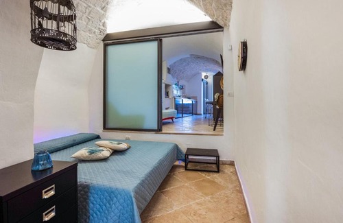 Ostuni Historic Centre House | Timeless Holiday Home in Ostuni with Bar and Fireplace