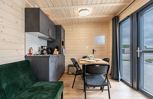 Lichterfeld-Schacksdorf Apartment | Tiny House ‘Ditmar’ with direct lake view, terrace, sauna and direct access to the lake