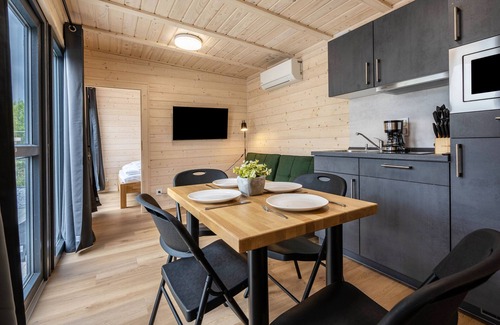 Lichterfeld-Schacksdorf Apartment | Tiny House ‘Ditmar’ with direct lake view, terrace, sauna and direct access to the lake