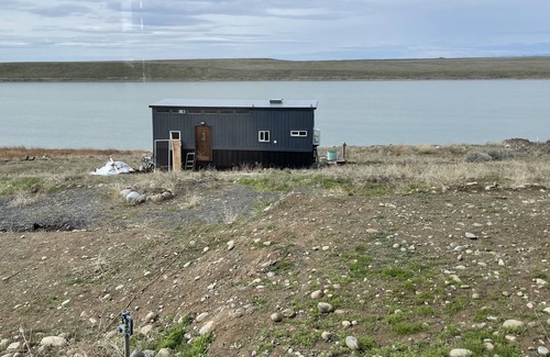 Stratford Cabin | Tiny House on Moses Lake with Dock, Boat Launch, Large deck w/ Hot Tub and grill