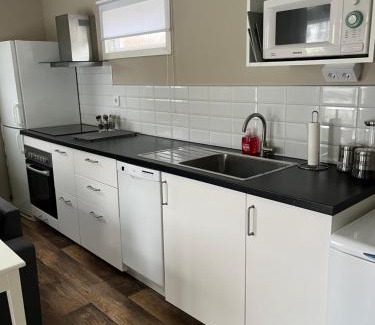 Heberg House | Tiny house with shared pool, max 4 people