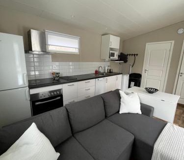 Heberg House | Tiny house with shared pool, max 4 people