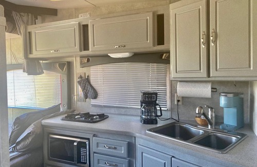 St. George House | Tiny RV with stone pool. Pets stay free! Sunny St George, Utah R&R awaits!