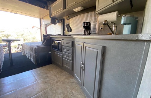 St. George House | Tiny RV with stone pool. Pets stay free! Sunny St George, Utah R&R awaits!