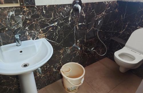 Kalasipalya Hotel | TKS Residency