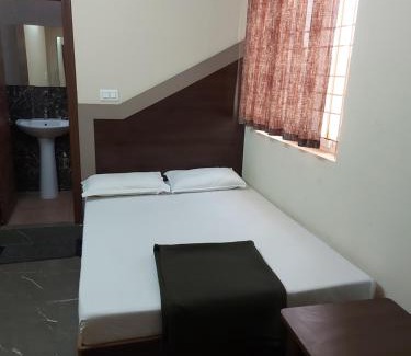 Kalasipalya Hotel | TKS Residency