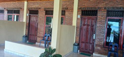 Tuk Tuk House | Toba Boi