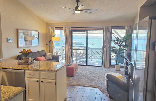 Osage Beach Condo | Tommy’s Place - Waterfront Escape with King Bed & Tropical Vibes