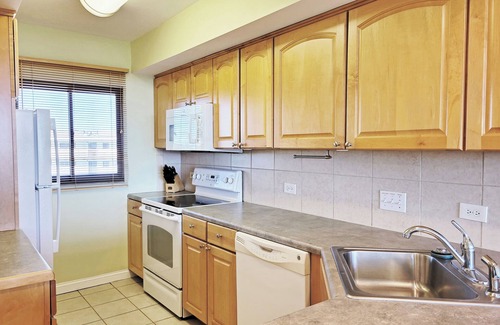 North Litchfield Beach Condo | Top Floor Condo Across from Beach Access, Balcony, Pool, Grill Area, Elevator