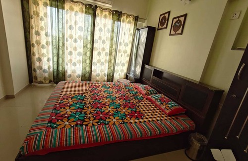 Kalol Apartment | Top Floor with Stadium View in Lush Green Heaven