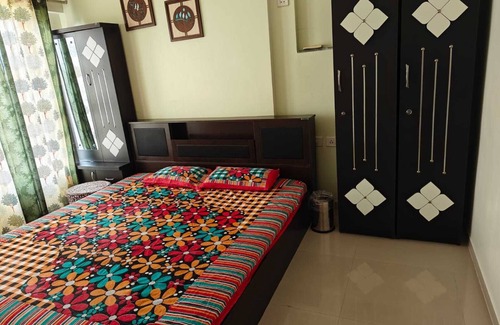 Kalol Apartment | Top Floor with Stadium View in Lush Green Heaven