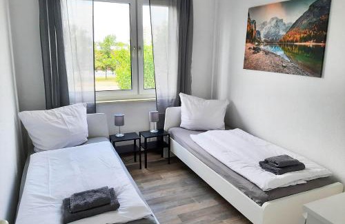 Nietleben Apartment | Top Monteurwohnungen Halle, Einzelbetten, Küche, Nähe Leuna & Schkeuditz